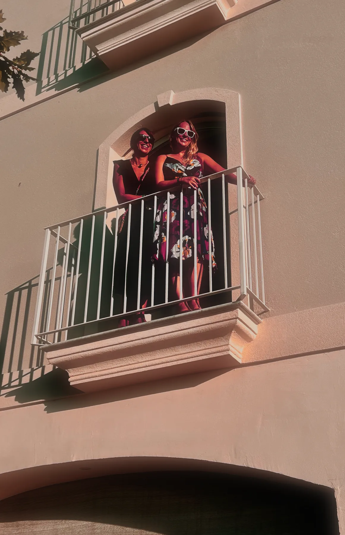 Two women enjoying a morning on a terrace in Southern Italy