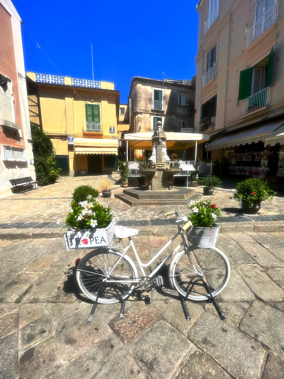 A bicycle resting on a Tropea street